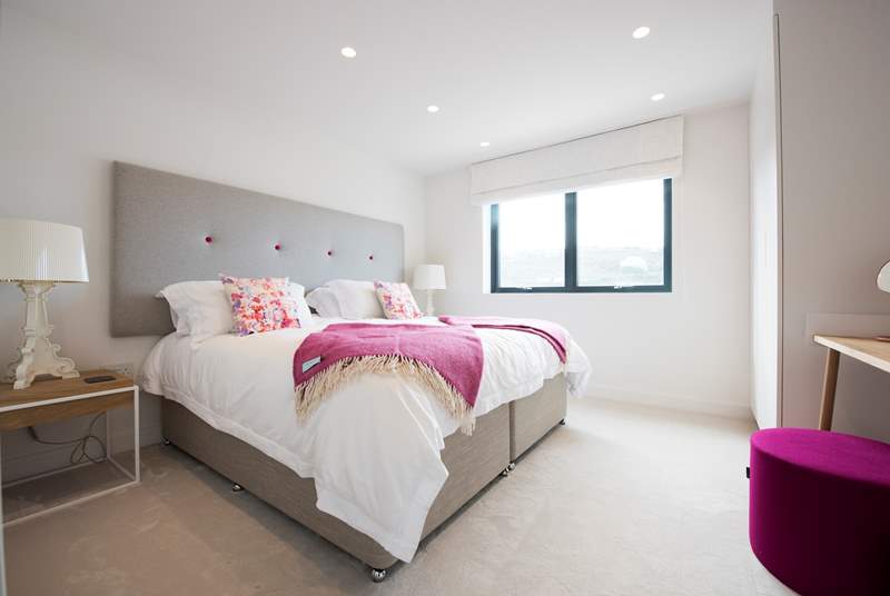 Bedroom two with a super-king size double bed which can also be two three-foot single beds on request.