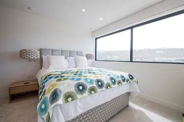 The master bedroom with king-size bed.