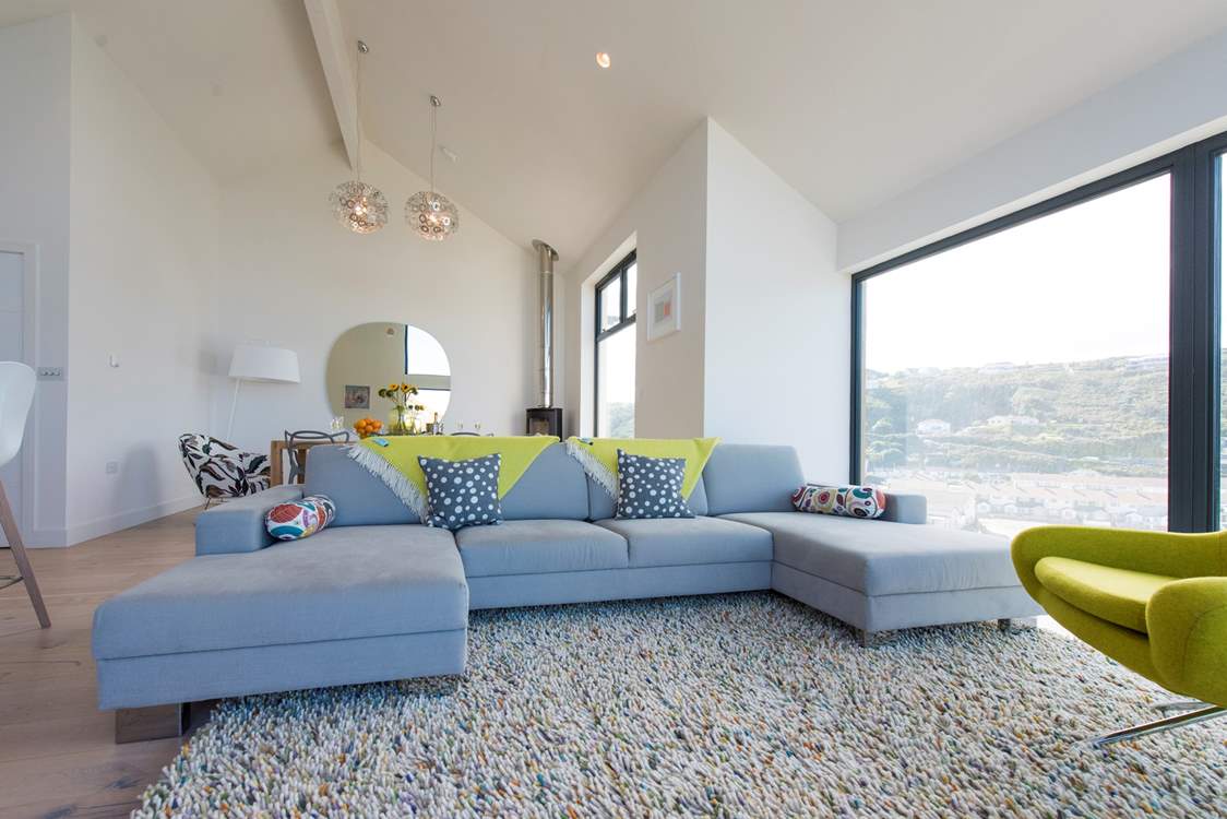 Relax on the large sofa and just take in that wonderful view.