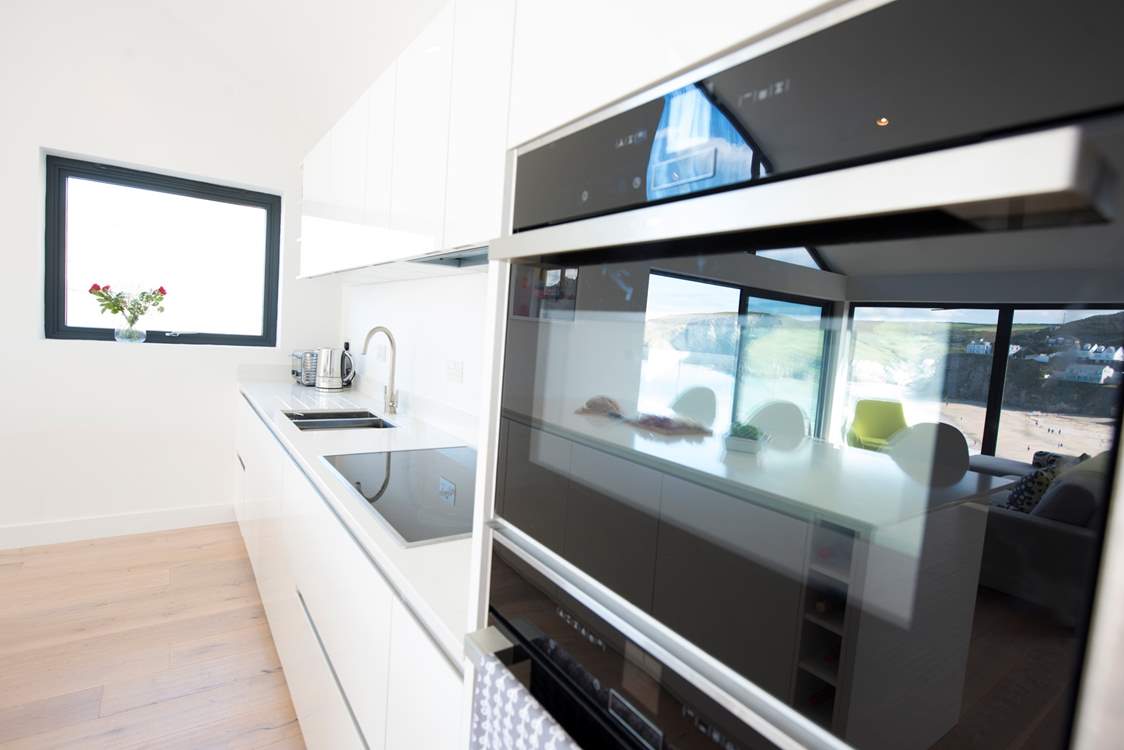 The sleek and well-equipped kitchen.