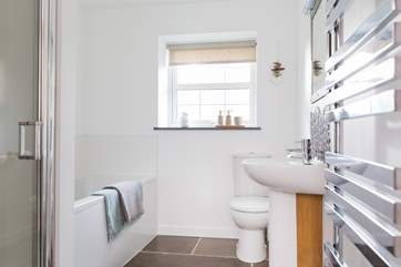 The family bathroom has both a bath and a separate shower cubicle.