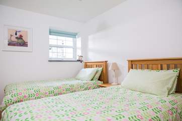 Bedroom 2 has twin beds.