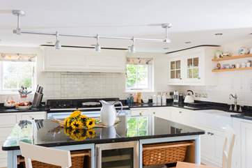 There's a four oven Aga and a huge kitchen island, perfect for big holiday meals.