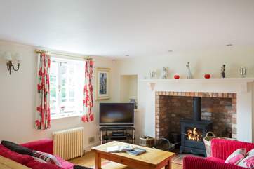This sitting-room has a TV with BT Infinity, Sky TV and an automated piano (hours of fun!).