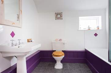 This bathroom is set between Bedroom 2 and Bedroom 3.