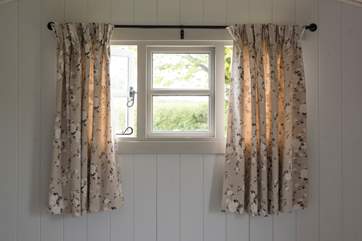 Pretty fabrics have been used throughout.