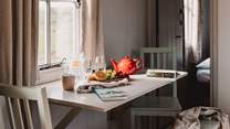 Enjoy a leisurely breakfast together before a day of adventures. 