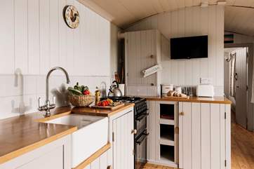 The gorgeous kitchen is superbly equipped with everything you'll need to rustle up a delicious family feast.