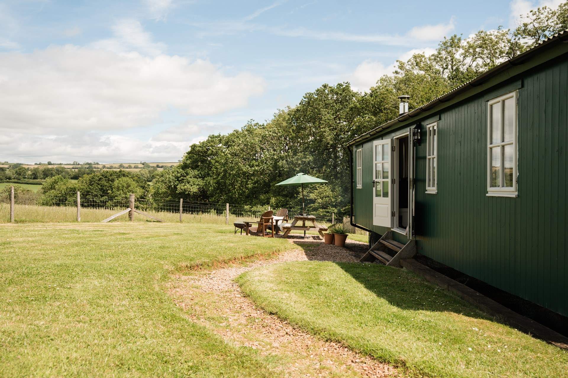 Four-legged friends are warmly welcomed here and will love roaming the lush green garden.