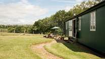 Four-legged friends are warmly welcomed here and will love roaming the lush green garden.