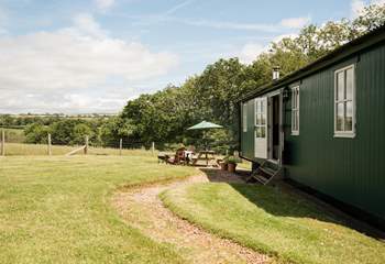 Four-legged friends are warmly welcomed here and will love roaming the lush green garden.