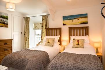 Twin bedroom, Bedroom 2, is beautifully furnished.
