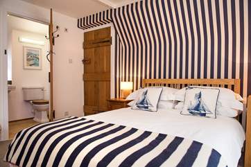 Stylish Bedroom 1 has an en suite shower-room.