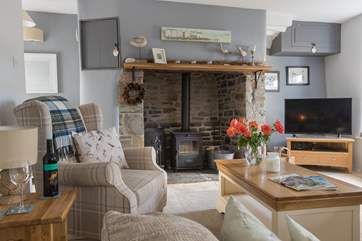 The toasty wood-burner makes this an ideal retreat all year round.