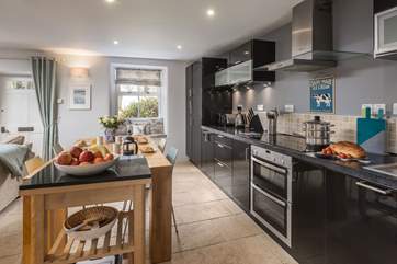 The stylish kitchen has all you need to serve up your holiday culinary delights.