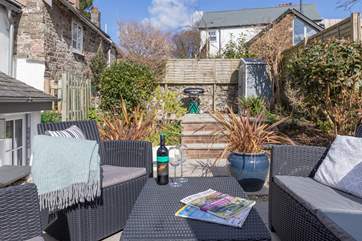 The pretty, enclosed courtyard garden is the ideal place to enjoy some quiet time.