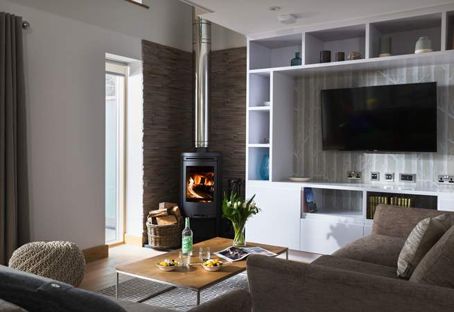 In the warmer months you won't need the wood-burner for heat but it gives you a warm and cosy glow.