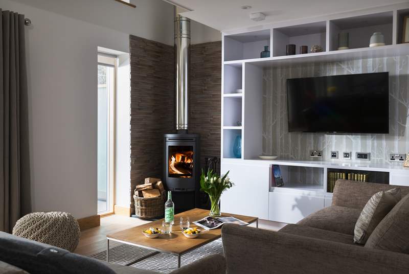 In the warmer months you won't need the wood-burner for heat but it gives you a warm and cosy glow.