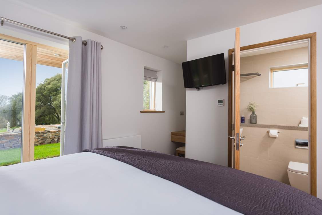 This ground floor bedroom also has an en suite shower-room.