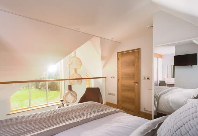 This top floor bedroom is wonderfully light and also enjoys views of the golf course (Bedroom 3).