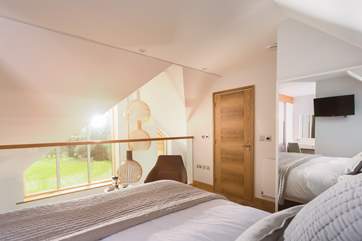This top floor bedroom is wonderfully light and also enjoys views of the golf course (Bedroom 3).