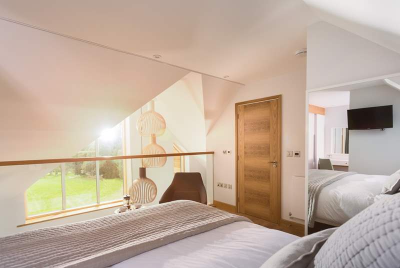 This top floor bedroom is wonderfully light and also enjoys views of the golf course (Bedroom 3).