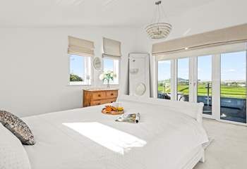 Views from the first floor master bedroom (Bedroom 3) and small balcony.