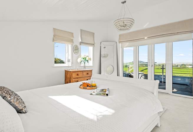 Views from the first floor master bedroom (Bedroom 3) and small balcony.