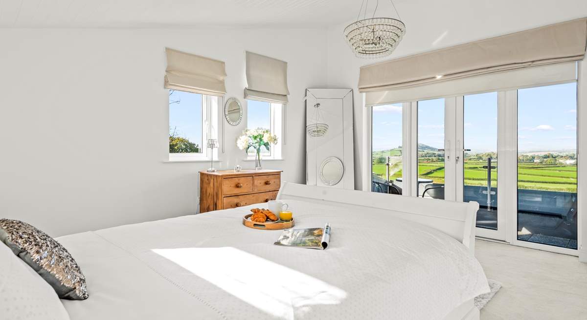 Views from the first floor master bedroom (Bedroom 3) and small balcony.