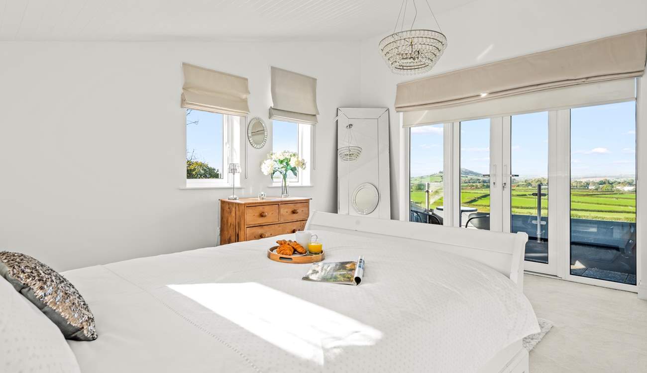 Views from the first floor master bedroom (Bedroom 3) and small balcony.