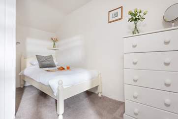 The pretty single bedroom where there is also room for a travel cot.