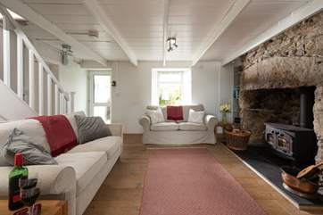The gorgeous sitting-room has plenty of sofa sitting.