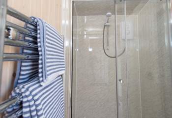 And the en suite shower-room with a double-size shower and heated towel rail.