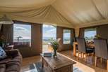 From inside and outside of this spacious safari tent, the views are simply stunning.