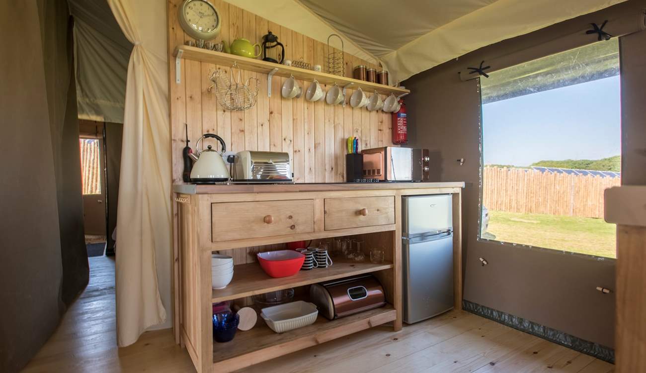 The kitchen is fully equipped with everything you will need for your glamping getaway. 