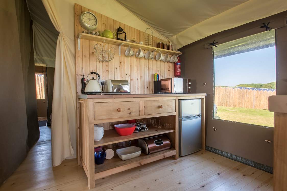 The kitchen is fully equipped with everything you will need for your glamping getaway.