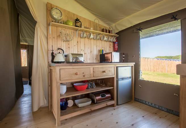 The kitchen is fully equipped with everything you will need for your glamping getaway. 