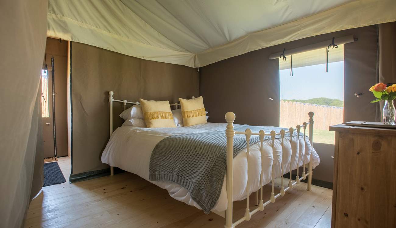 The main bedroom has a king sized bed. 