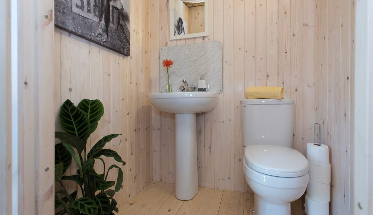 At the back of the tent is your en suite cloakroom. 