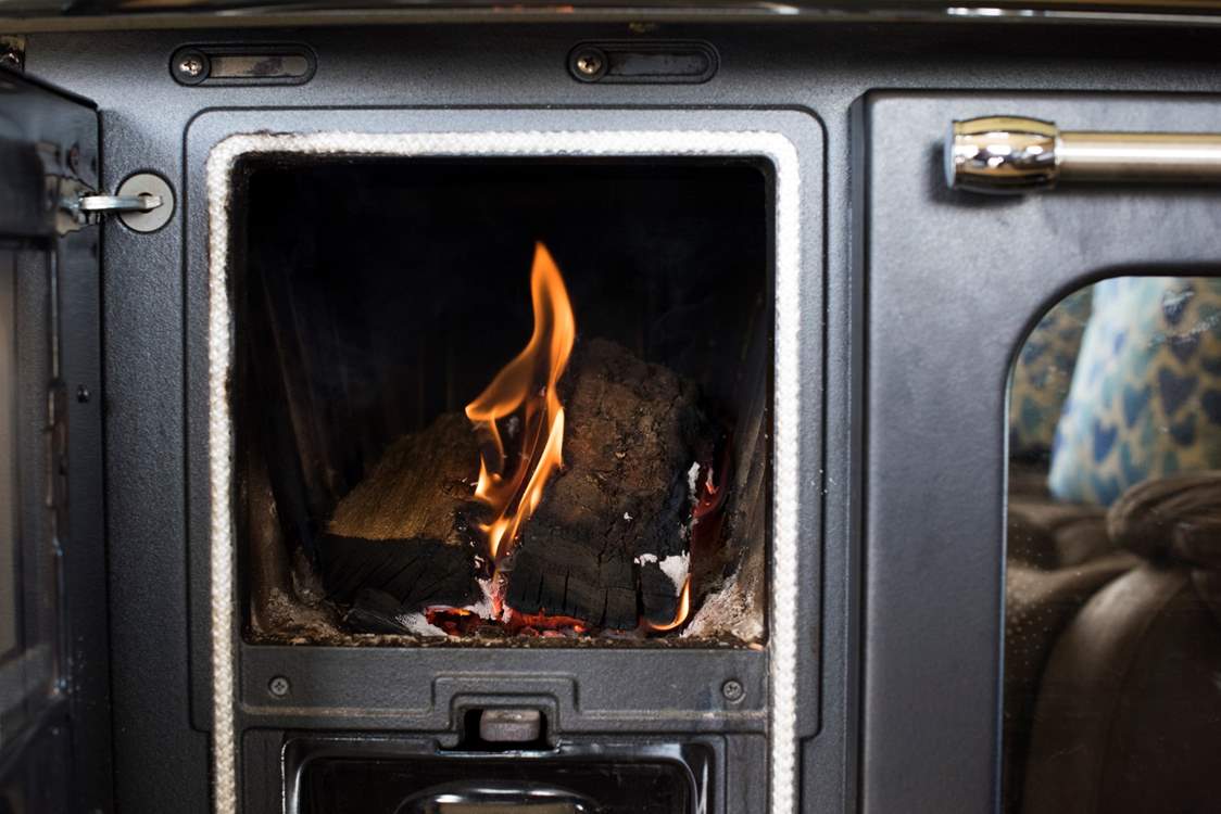 Cosiness is ensured with the wood-fired range.