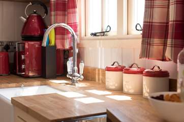 Of course, there is hot and cold water to the kitchen sink, in true luxury glamping style.