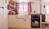 The fully-fitted kitchen has a full-size oven and fridge. - Thumbnail Image