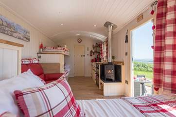 There's a king-size double bed, bunk-beds, kitchen area and en suite shower-room too.