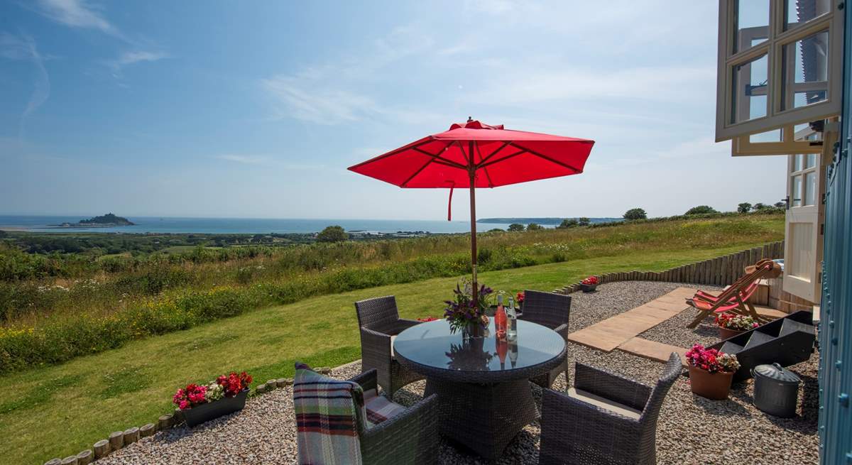 Relaxing al fresco, taking in the stunning view is a must.