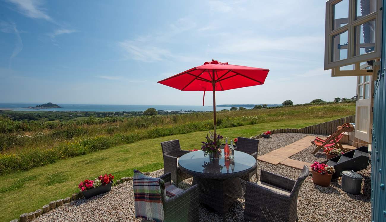 Relaxing al fresco, taking in the stunning view is a must.