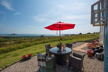 Relaxing al fresco, taking in the stunning view, is a must.