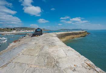 The iconic Cobb, with views across to Golden Cap, just a five minute walk from The Chalet on the Beach