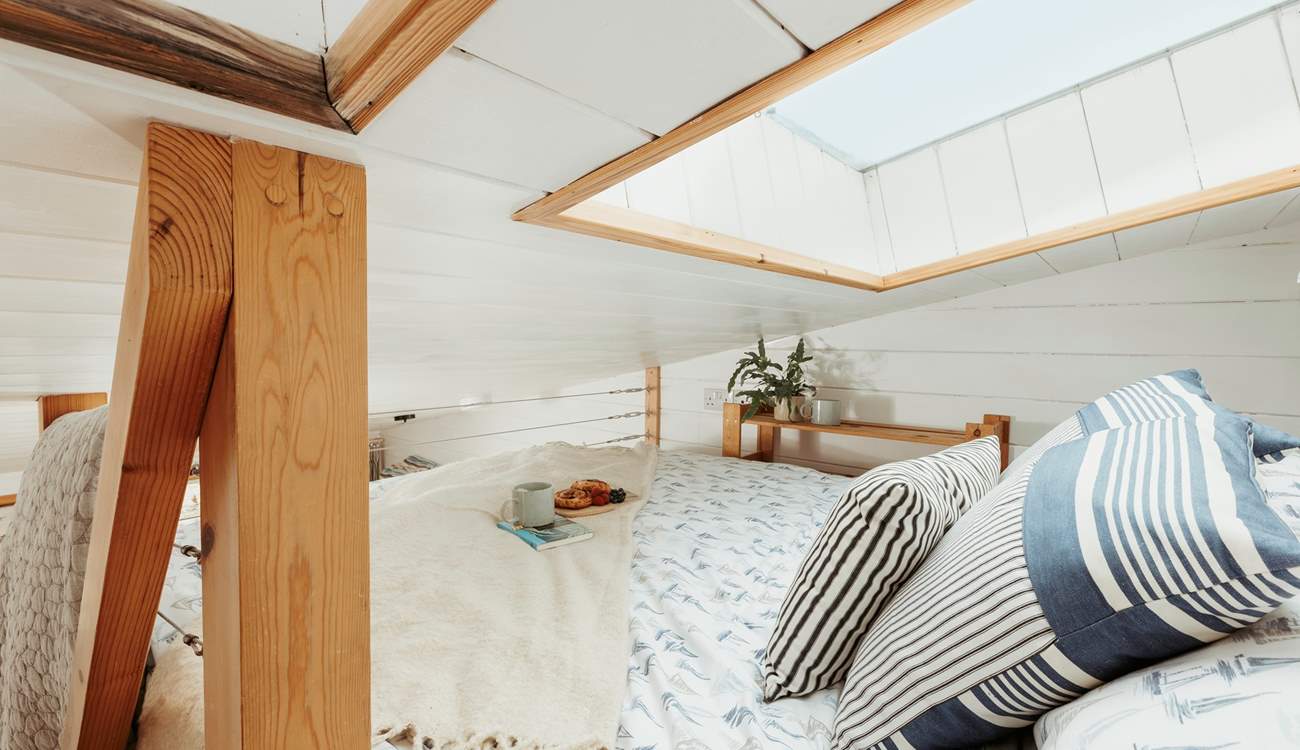 The charming sleeping area has limited headroom; 98cm into the window recess, 77cm to the ceiling and 35cm at the foot of the bed.