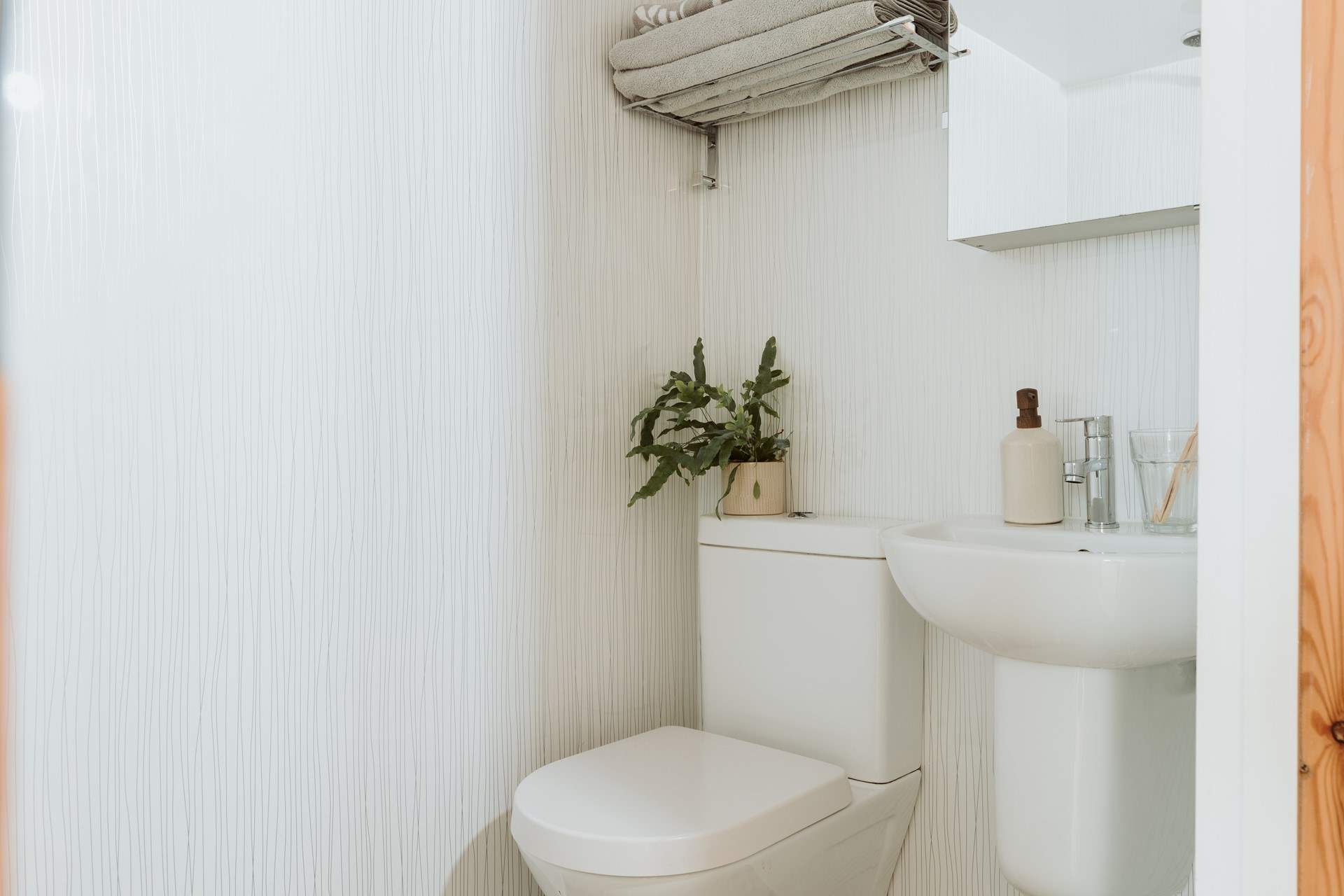 The modern wet room is just the spot to refresh salt-kissed skin. 