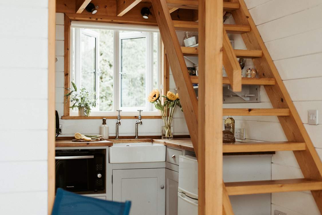 Climb the stairs to find your cosy double bed.
